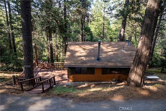 22490 Rockwell Rd, Cedarpines Park, CA 92322 - view of home's exterior with a deck