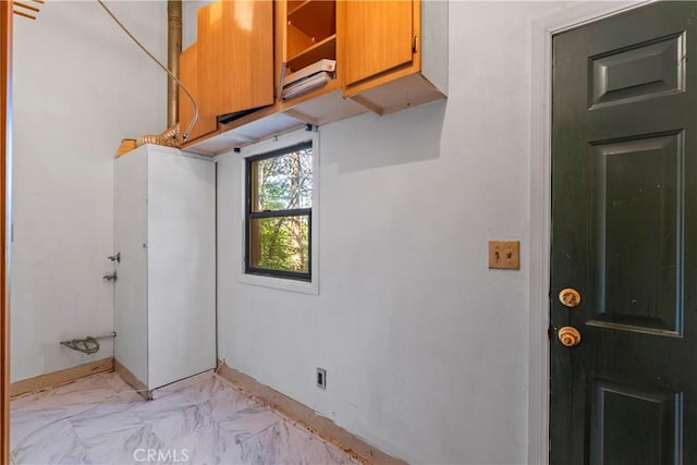 22490 Rockwell Rd, Cedarpines Park, CA 92322 - laundry area featuring light marble finish floors and baseboards