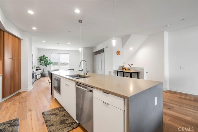 1029 White Knoll Dr, Los Angeles, CA 90012 - kitchen featuring stainless steel dishwasher, modern cabinets, an island with sink, light wood-style flooring, and recessed lighting
