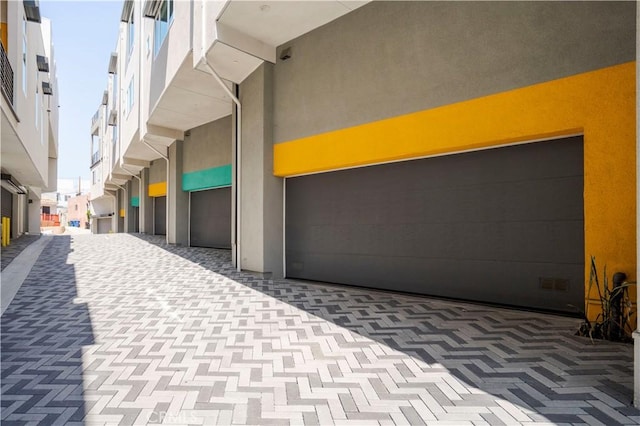 1029 White Knoll Dr, Los Angeles, CA 90012 - view of home's community with a garage and decorative driveway