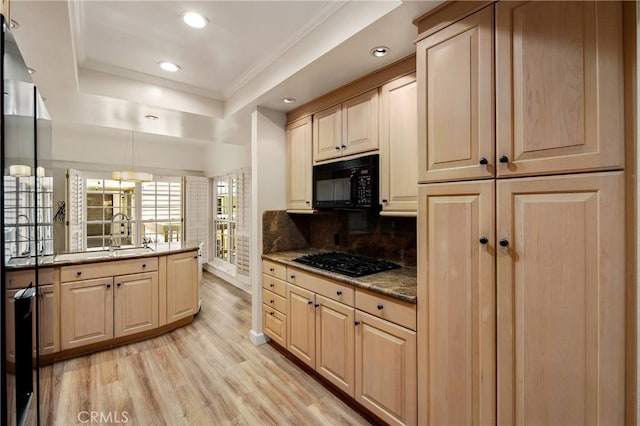 13078 Mindanao Way Unit 211, Marina Del Rey, CA 90292 - kitchen featuring black appliances, a tray ceiling, recessed lighting, light wood-style flooring, and light brown cabinetry