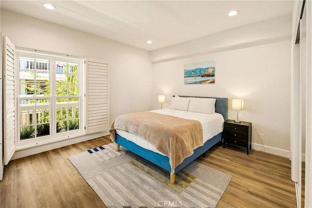 13078 Mindanao Way Unit 211, Marina Del Rey, CA 90292 - bedroom with wood finished floors and recessed lighting