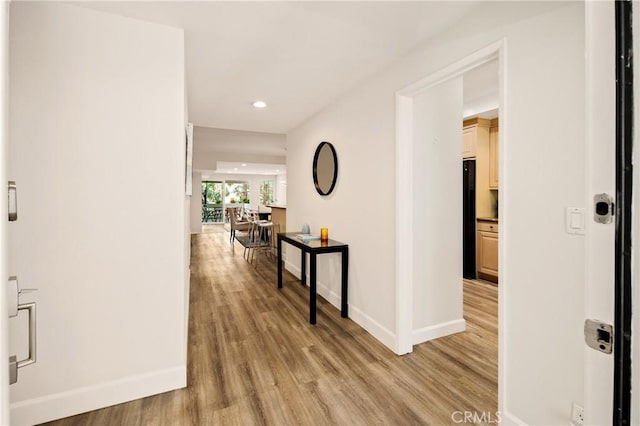 13078 Mindanao Way Unit 211, Marina Del Rey, CA 90292 - hall with light wood-style floors and recessed lighting
