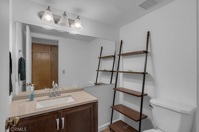 8939 Gallatin Rd Unit 116, Pico Rivera, CA 90660 - half bathroom with vanity and wood finished floors