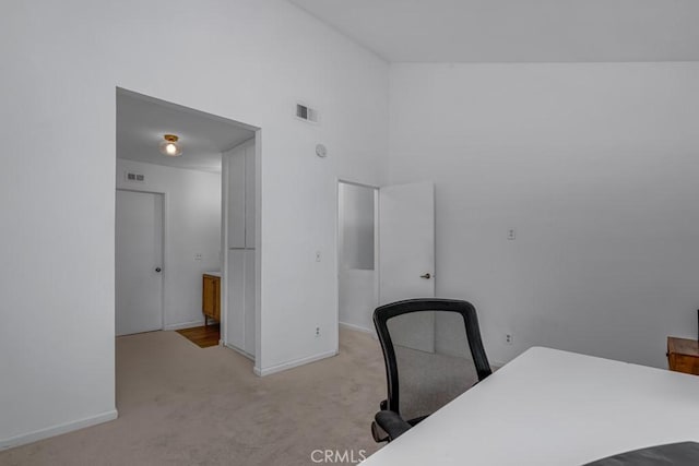 8939 Gallatin Rd Unit 116, Pico Rivera, CA 90660 - unfurnished office with light colored carpet and a towering ceiling