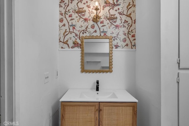 8939 Gallatin Rd Unit 116, Pico Rivera, CA 90660 - bathroom featuring vanity, wallpapered walls, and a wainscoted wall