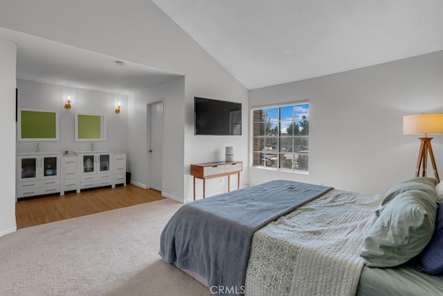 8939 Gallatin Rd Unit 116, Pico Rivera, CA 90660 - bedroom featuring carpet and vaulted ceiling
