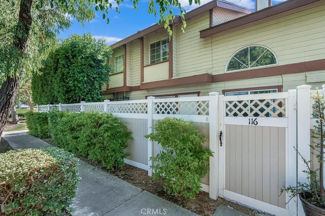 8939 Gallatin Rd Unit 116, Pico Rivera, CA 90660 - view of side of home with a gate
