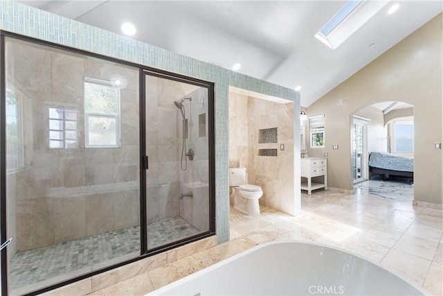 918 Reposado Dr, La Habra Heights, CA 90631 - full bath with a stall shower, a bathtub, ensuite bath, vaulted ceiling, and a skylight
