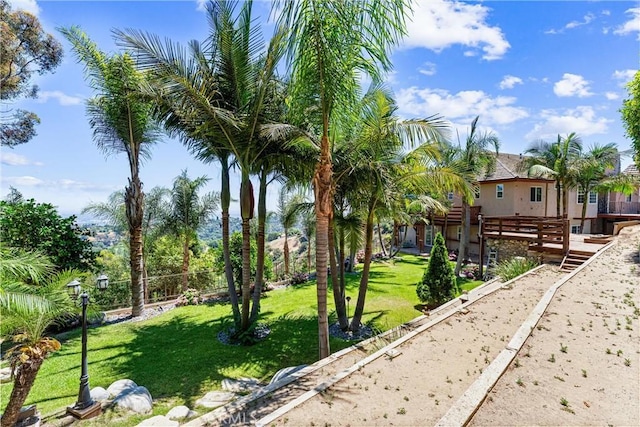 918 Reposado Dr, La Habra Heights, CA 90631 - view of property's community with a wooden deck and a lawn