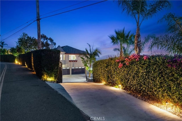 918 Reposado Dr, La Habra Heights, CA 90631 - view of front facade featuring driveway and stucco siding