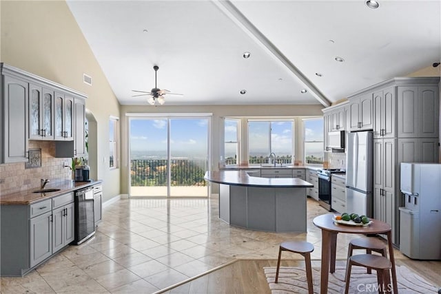 918 Reposado Dr, La Habra Heights, CA 90631 - kitchen featuring gray cabinets, tasteful backsplash, stainless steel appliances, ceiling fan, and wine cooler