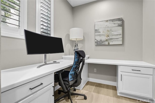 29 Hinterland Way, Ladera Ranch, CA 92694 - home office with built in desk and light wood-style floors
