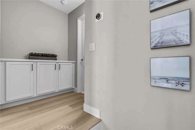 29 Hinterland Way, Ladera Ranch, CA 92694 - hallway featuring light wood finished floors and baseboards