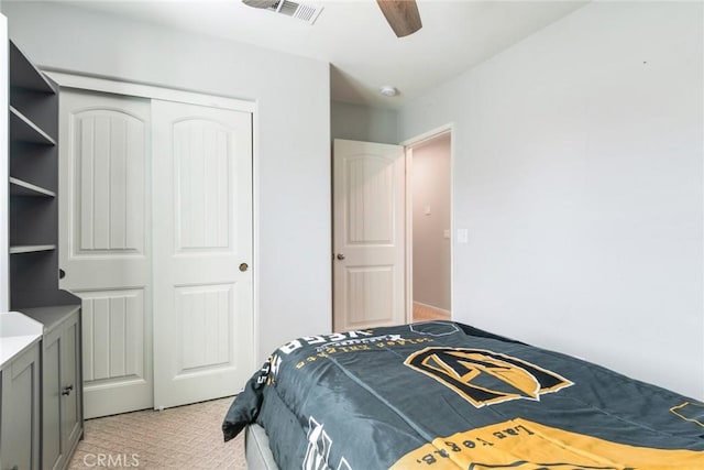 4989 River Ash Way, Fontana, CA 92336 - bedroom featuring a closet, light colored carpet, and a ceiling fan