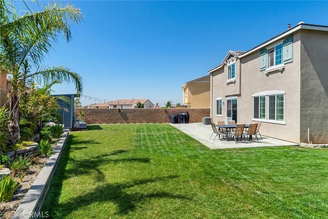 4989 River Ash Way, Fontana, CA 92336 - fenced backyard featuring a patio