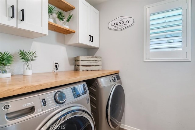 4989 River Ash Way, Fontana, CA 92336 - laundry room featuring separate washer and dryer and cabinet space