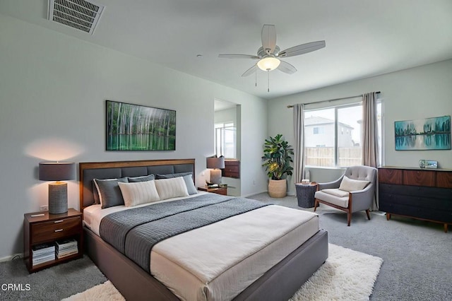 3016 Via Bella Rosa Ave, Rosamond, CA 93560 - carpeted bedroom with a ceiling fan and baseboards