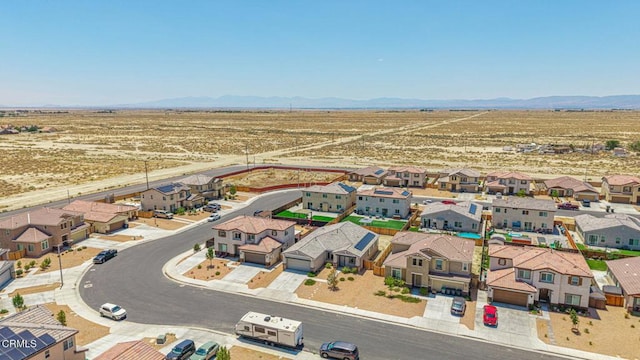 3016 Via Bella Rosa Ave, Rosamond, CA 93560 - aerial view of residential area with mountains and a desert landscape