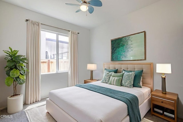 3016 Via Bella Rosa Ave, Rosamond, CA 93560 - carpeted bedroom featuring multiple windows and a ceiling fan