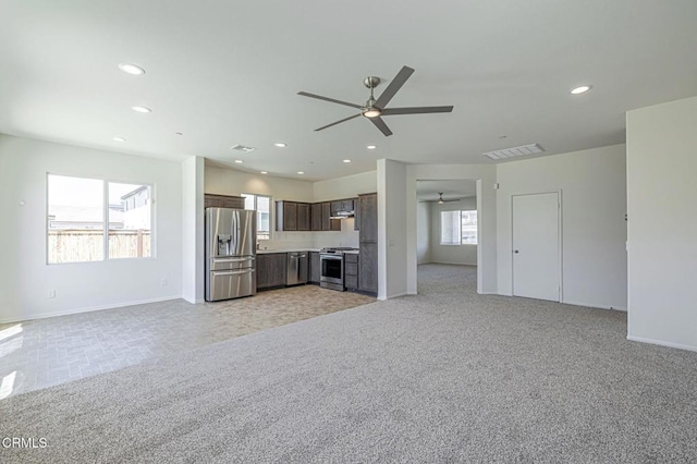 3016 Via Bella Rosa Ave, Rosamond, CA 93560 - unfurnished living room with a ceiling fan and recessed lighting