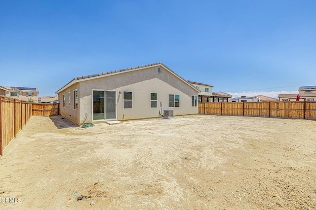 3016 Via Bella Rosa Ave, Rosamond, CA 93560 - rear view of property with stucco siding and a fenced backyard