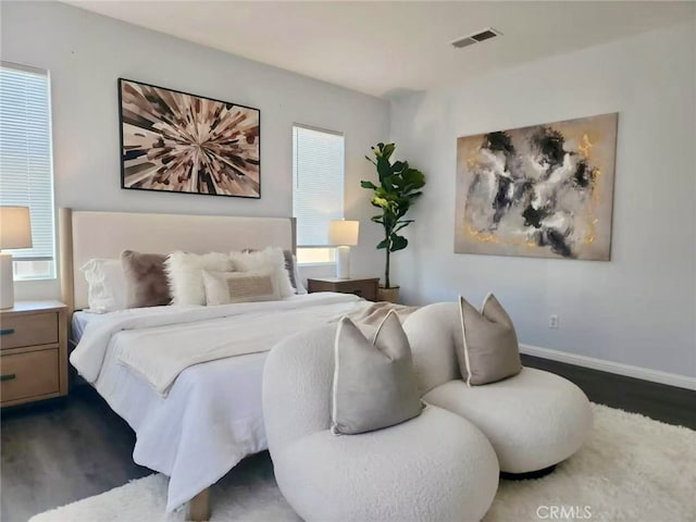 6219 S Kingsmill Ct, Fontana, CA 92336 - bedroom featuring dark wood-style floors and baseboards