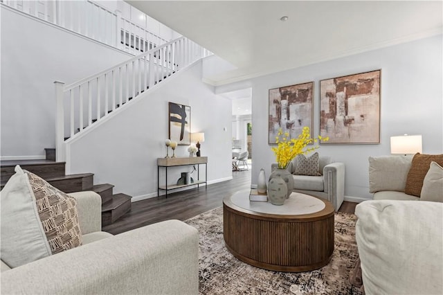 6219 S Kingsmill Ct, Fontana, CA 92336 - living room featuring stairs and wood finished floors