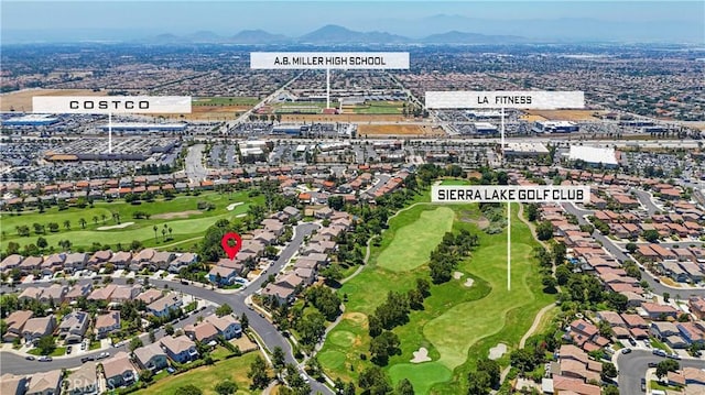 6219 S Kingsmill Ct, Fontana, CA 92336 - aerial view of property's location featuring a mountain backdrop and a golf club