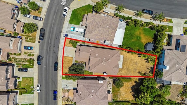 6219 S Kingsmill Ct, Fontana, CA 92336 - aerial perspective of suburban area featuring property parcel outlined