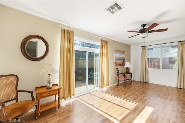 35842 Ellison Ln Unit 2, Murrieta, CA 92562 - living area featuring wood finished floors and ceiling fan