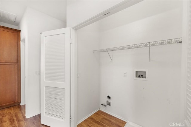 35842 Ellison Ln Unit 2, Murrieta, CA 92562 - laundry room featuring washer hookup, light wood-style floors, and hookup for an electric dryer