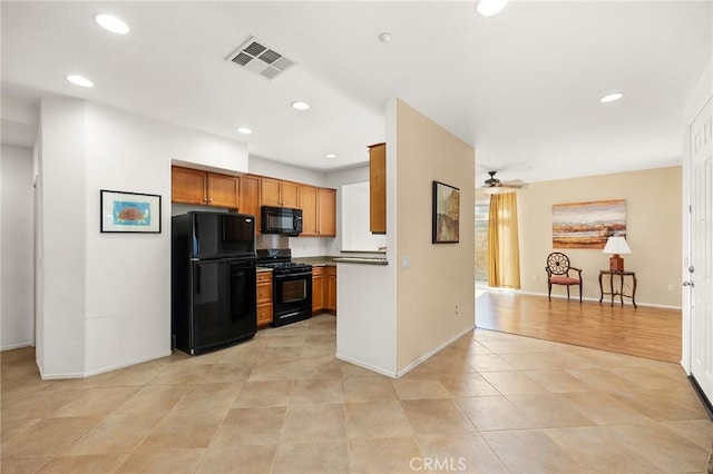 35842 Ellison Ln Unit 2, Murrieta, CA 92562 - kitchen featuring black appliances, a ceiling fan, recessed lighting, light tile patterned floors, and brown cabinets
