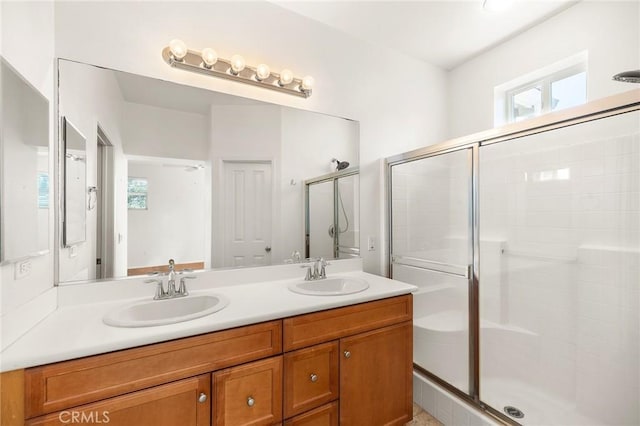 35842 Ellison Ln Unit 2, Murrieta, CA 92562 - bathroom with double vanity, a stall shower, and healthy amount of natural light