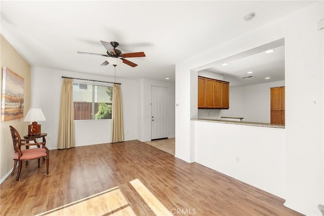 35842 Ellison Ln Unit 2, Murrieta, CA 92562 - living area with ceiling fan, light wood finished floors, and recessed lighting