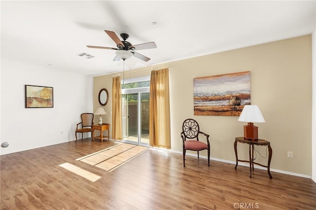 35842 Ellison Ln Unit 2, Murrieta, CA 92562 - sitting room featuring wood finished floors and a ceiling fan