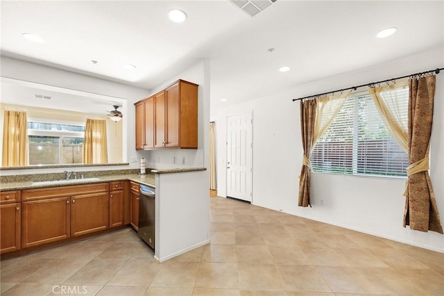 35842 Ellison Ln Unit 2, Murrieta, CA 92562 - kitchen featuring dishwasher, healthy amount of natural light, brown cabinets, and recessed lighting