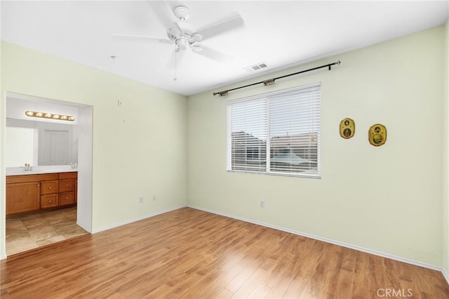 35842 Ellison Ln Unit 2, Murrieta, CA 92562 - unfurnished bedroom featuring light wood finished floors and ensuite bath