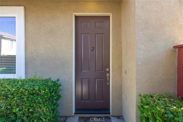 35842 Ellison Ln Unit 2, Murrieta, CA 92562 - doorway to property with stucco siding