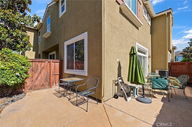 35842 Ellison Ln Unit 2, Murrieta, CA 92562 - view of patio / terrace featuring a gate and outdoor dining space