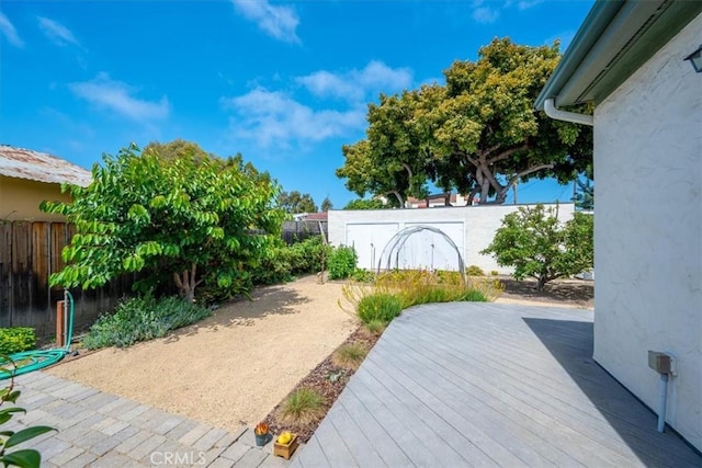 215 S Mason St, Arroyo Grande, CA 93420 - fenced backyard with a wooden deck