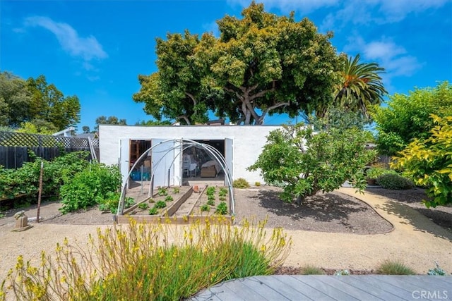 215 S Mason St, Arroyo Grande, CA 93420 - exterior space with a vegetable garden and an outbuilding
