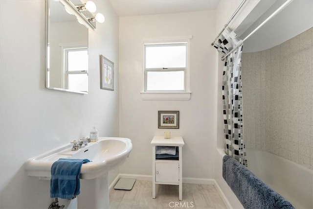 215 S Mason St, Arroyo Grande, CA 93420 - bathroom with healthy amount of natural light and shower / bathtub combination with curtain