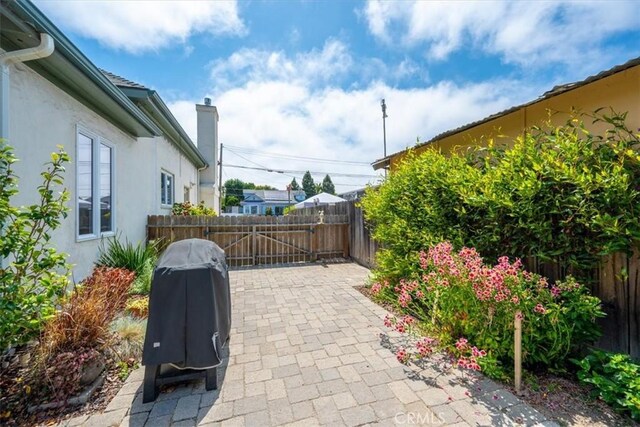 215 S Mason St, Arroyo Grande, CA 93420 - fenced backyard featuring a patio area and area for grilling