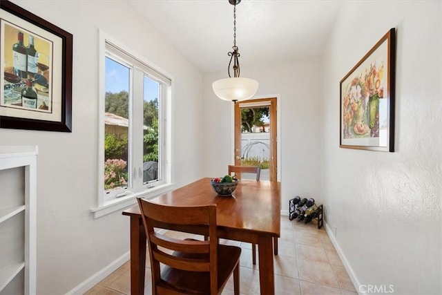 215 S Mason St, Arroyo Grande, CA 93420 - dining room featuring light tile patterned flooring and baseboards