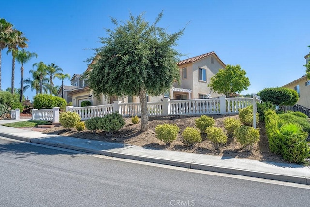 30118 Galbreth Ct, Castaic, CA 91384 - view of front of property with a fenced front yard and stucco siding