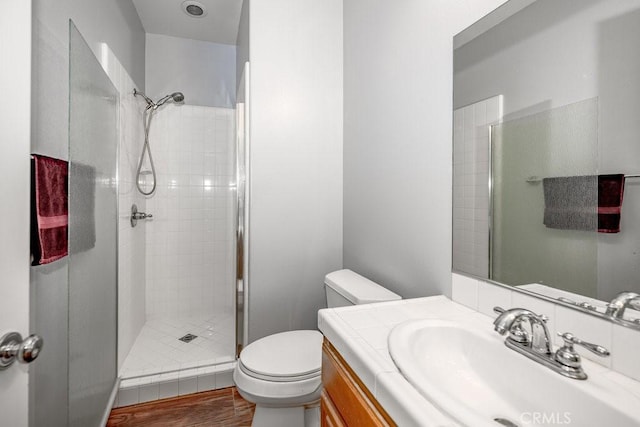 30118 Galbreth Ct, Castaic, CA 91384 - full bathroom featuring tiled shower, vanity, and wood finished floors