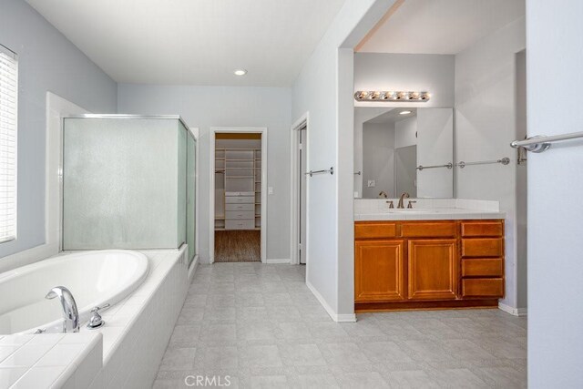 30118 Galbreth Ct, Castaic, CA 91384 - full bath with a stall shower, vanity, a garden tub, and a spacious closet