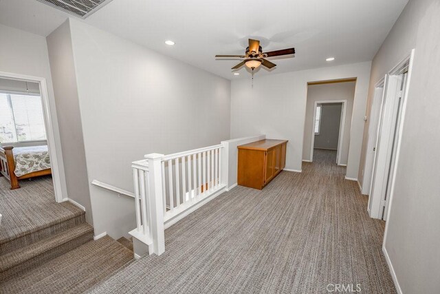 30118 Galbreth Ct, Castaic, CA 91384 - corridor with light carpet, an upstairs landing, and recessed lighting