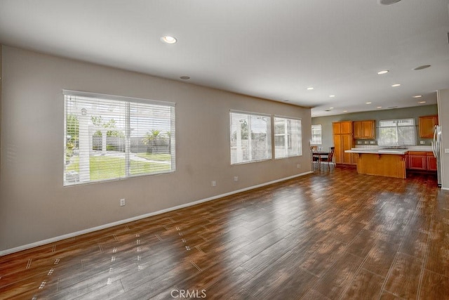 30118 Galbreth Ct, Castaic, CA 91384 - unfurnished living room with dark wood-type flooring and recessed lighting